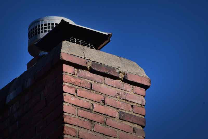 metal chimney cap on brink chimney
