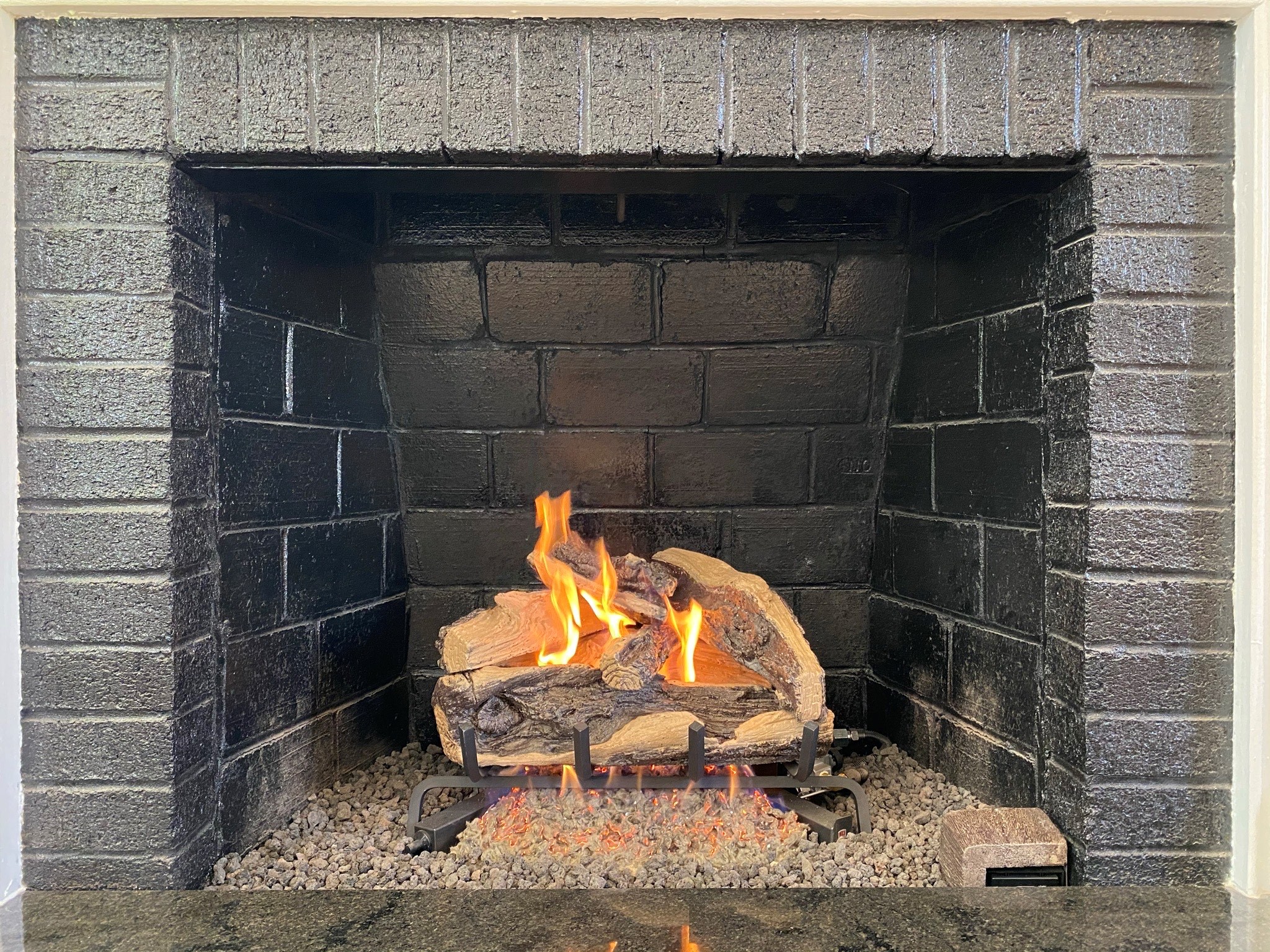 Gray brick fireplace