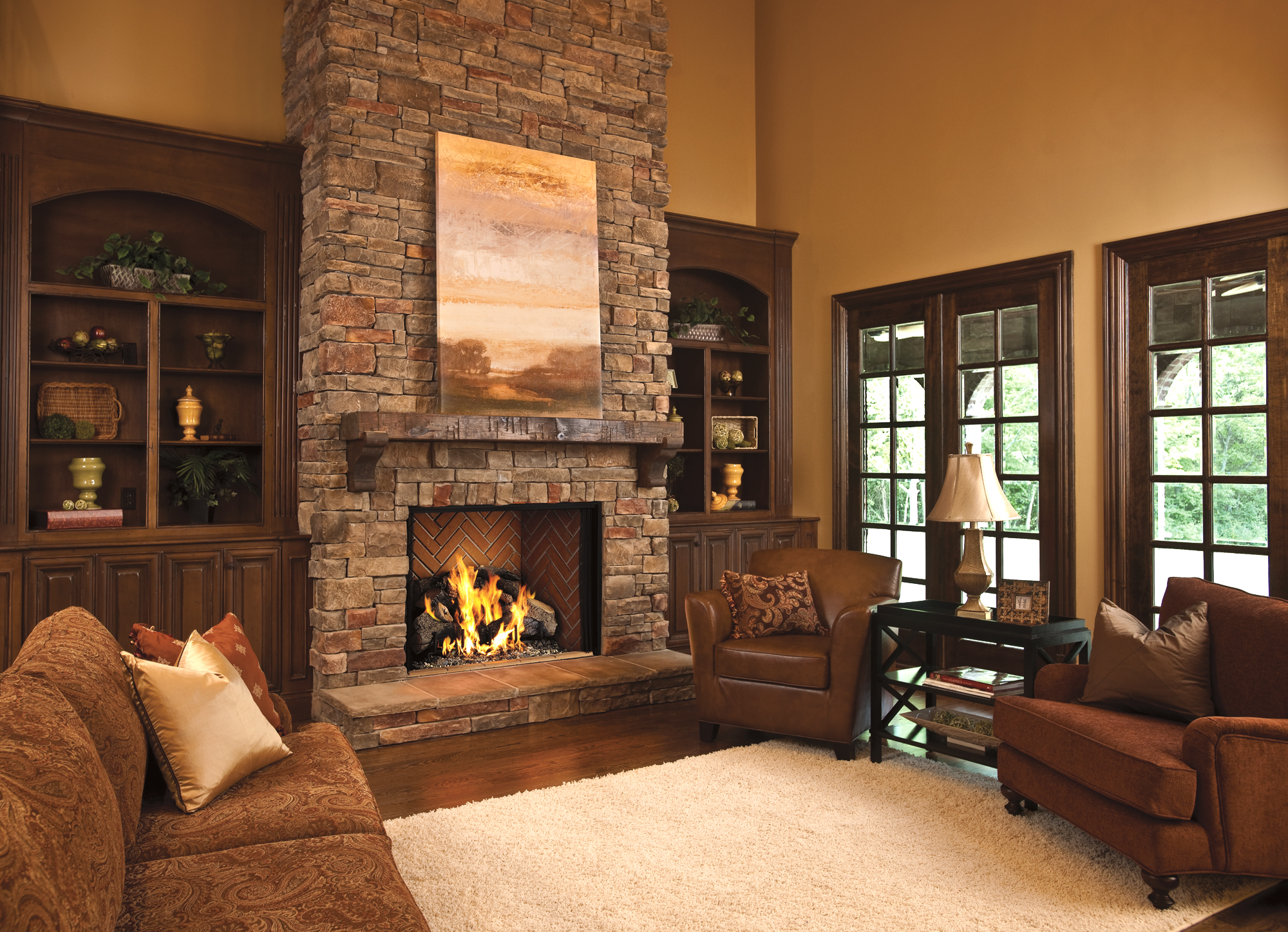 Real Fyre gas fireplace insert in a stone fireplace